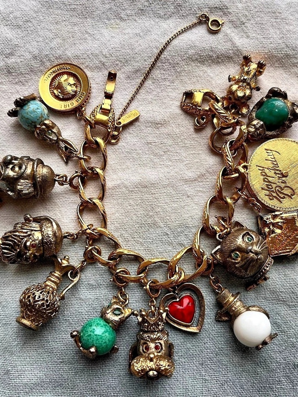 Monet Gold-Tone Charm Bracelet Green Accents